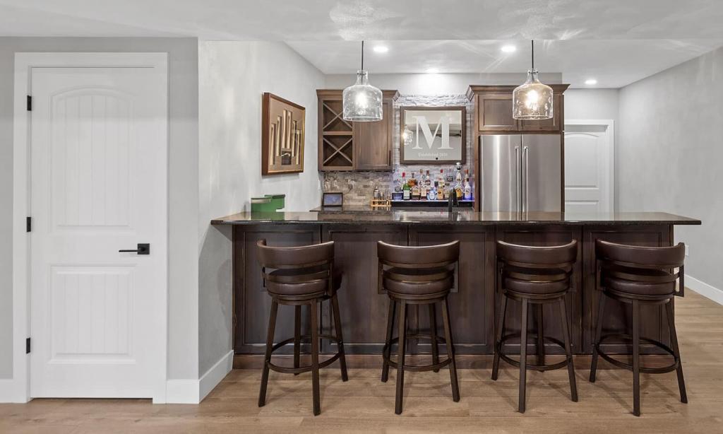 basement bar with built in cabinets