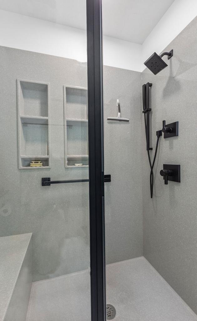 modern shower with built in cubbies