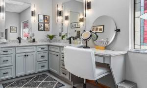 white bathroom with modern light fixtures