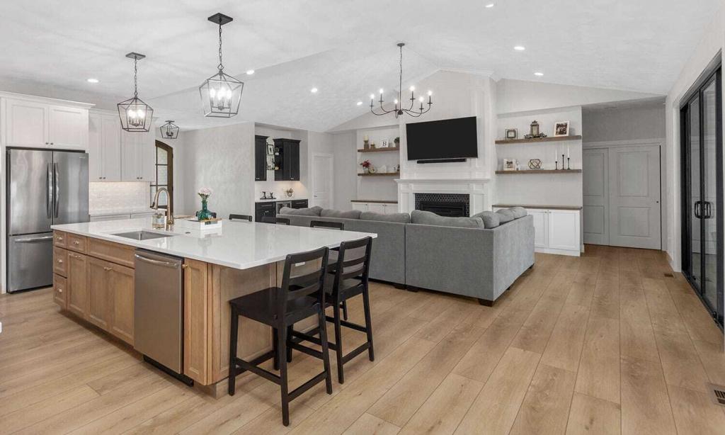 white island in a kitchen with builtin bookcases